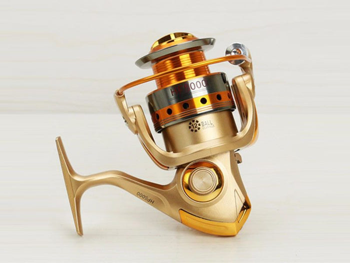 YUMOSHI HF6000 spinning fishing reel with handle and spool, high-quality bearings for smooth fishing from dealonline.co.nz